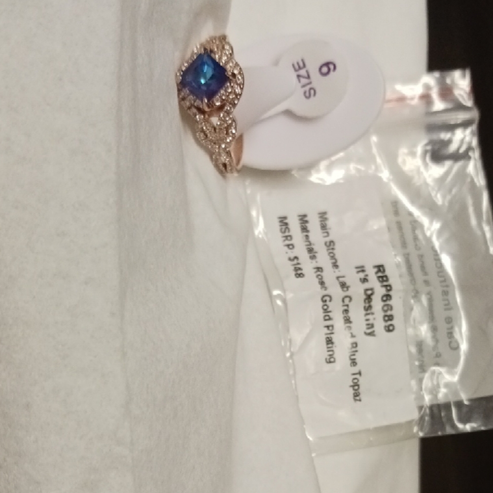 This Stunning Blue Topaz Rose Gold Band Is Your Destiny.